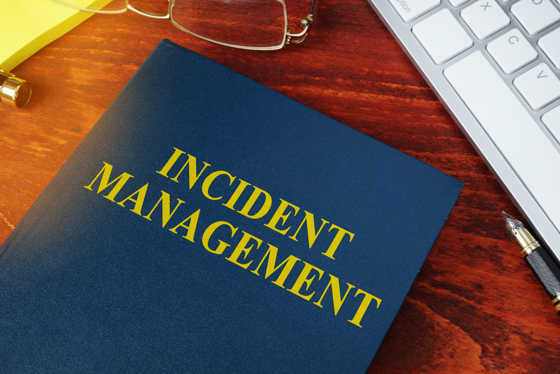 Incident Management concept. Book on the office desk.